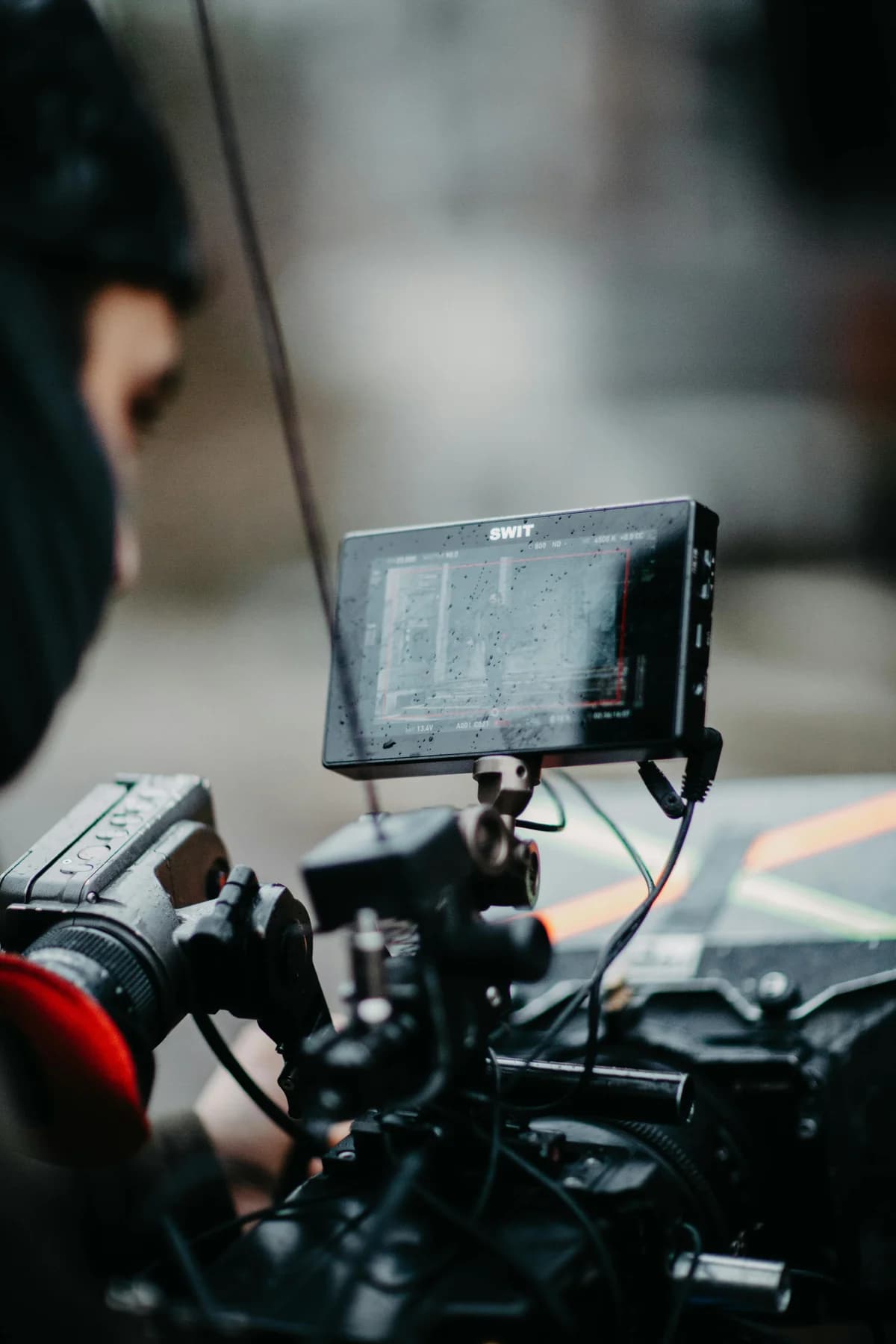 Field monitor on a camera rig for checking video settings